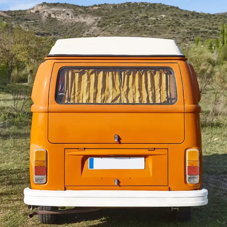 Vintage orange VW camper van restoration with custom parts available at B&S RV Supply in Winston, Oregon.